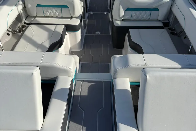 Slide: The Image of 2022 Regal LS2 boat interior with luxurious white seating and modern design. - 5