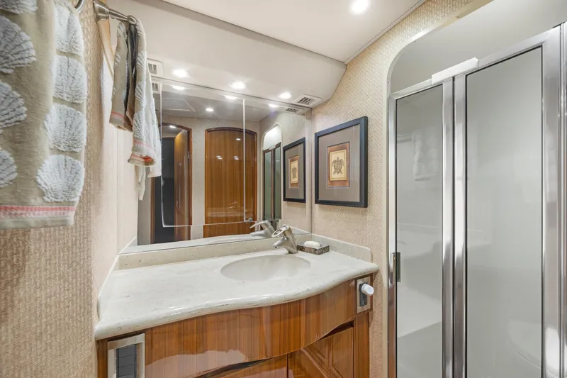 Slide: The Image of Luxurious bathroom interior of 2009 Viking 50 Convertible yacht with modern fixtures. - 27