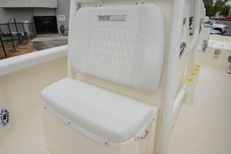 Slide: The Image of 2026 Pathfinder 2400 TRS boat seat with white upholstery and hexagonal pattern design. - 37