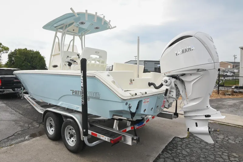 Slide: The Image of 2026 Pathfinder 2400 TRS boat on trailer with Yamaha outboard motor. - 5