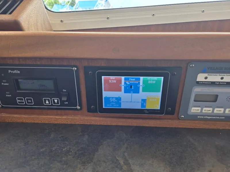 Slide: The Image of Control panel of a 2010 American Tug 49 Limited boat with various instruments. - 47