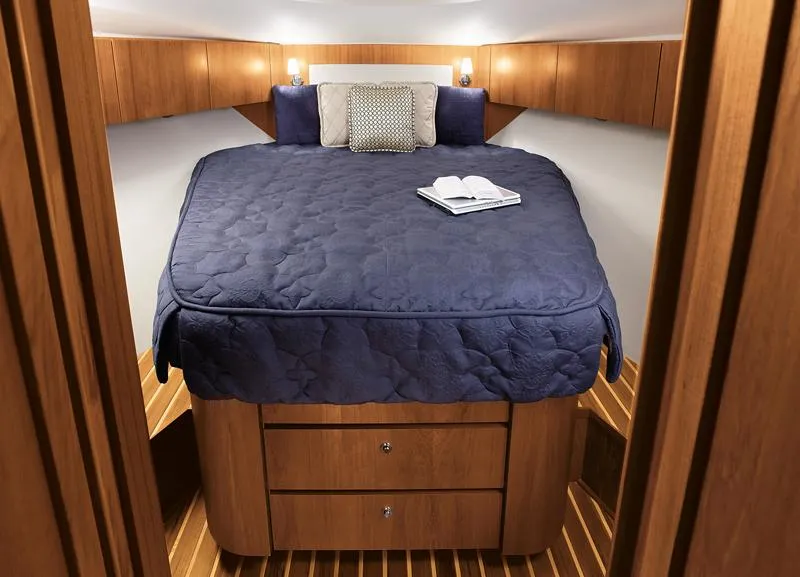 Slide: The Image of Manufacturer Provided Image: 2016 Tiara Yachts 4300 Open cabin with bed and wooden interior. - 12