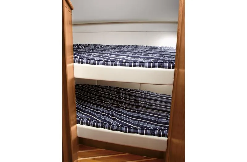 Slide: The Image of Manufacturer Provided Image: Bunk beds in the 2016 Tiara Yachts 4300 Open cabin. - 13