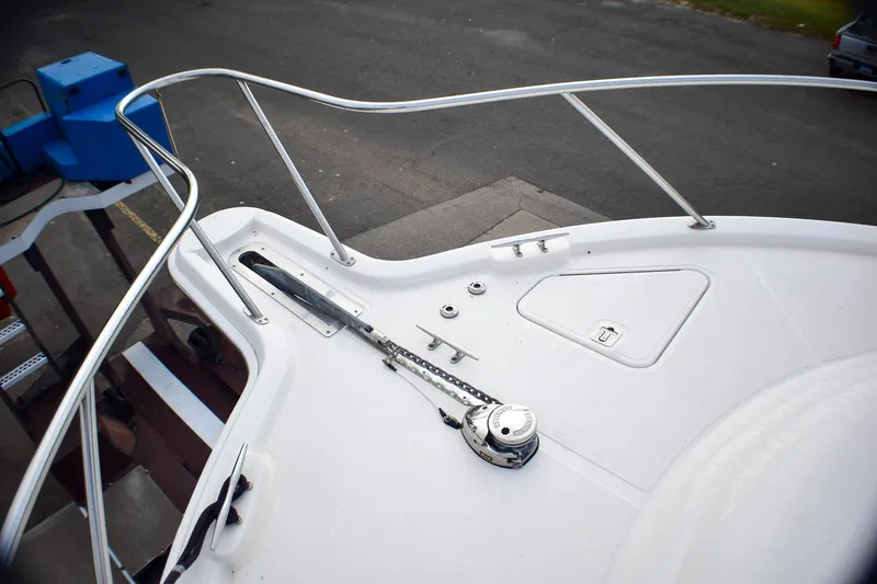 Slide: The Image of 2016 Tiara Yachts 4300 Open bow deck with railing and anchor system. - 32