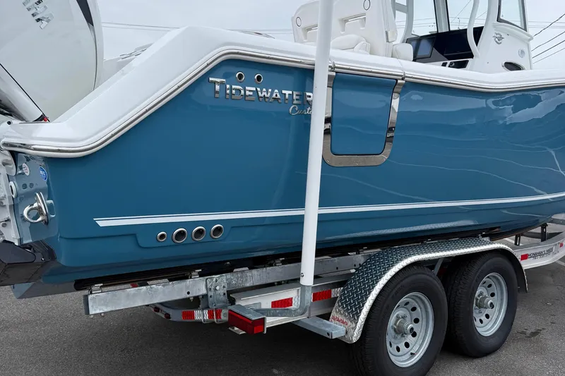 Slide: The Image of Close-up of Yamaha outboard motor on 2026 Tidewater 282 CC Adventure boat. - 11