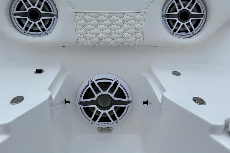 Slide: The Image of Control panel and cup holders on 2026 Tidewater 282 CC Adventure boat. - 27