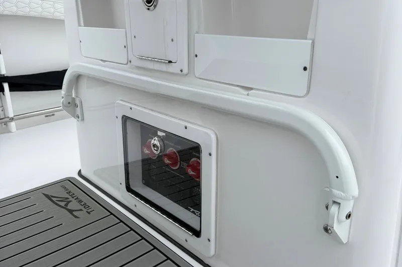 Slide: The Image of Close-up of a USB-C charging port on a 2026 Tidewater 282 CC Adventure boat. - 34
