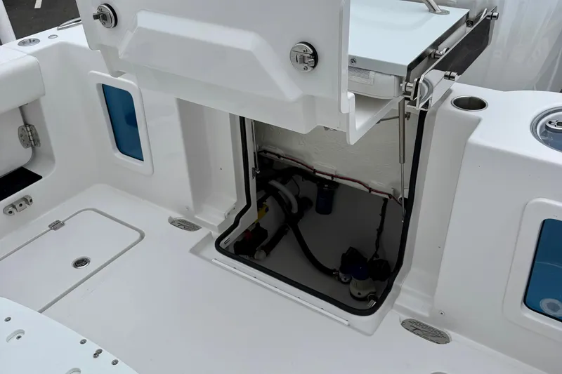 Slide: The Image of White cushioned seat on 2026 Tidewater 282 CC Adventure boat, featuring sleek design and modern stitching. - 39