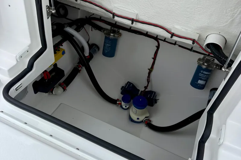 Slide: The Image of 2026 Tidewater 282 CC Adventure boat with sleek seating and storage compartments. - 40