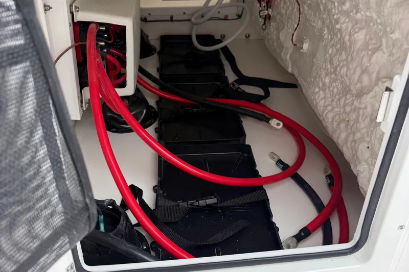 Slide: The Image of Tidewater 282 CC Adventure 2026 boat deck with rod holders and ladder. - 43