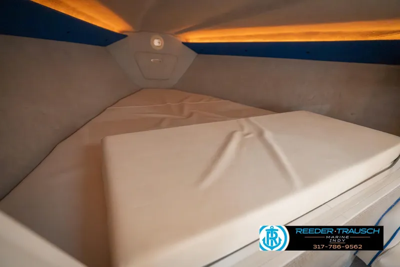 Slide: The Image of Cozy cabin interior of 2001 Nordic Heat 28 boat with soft lighting. - 47