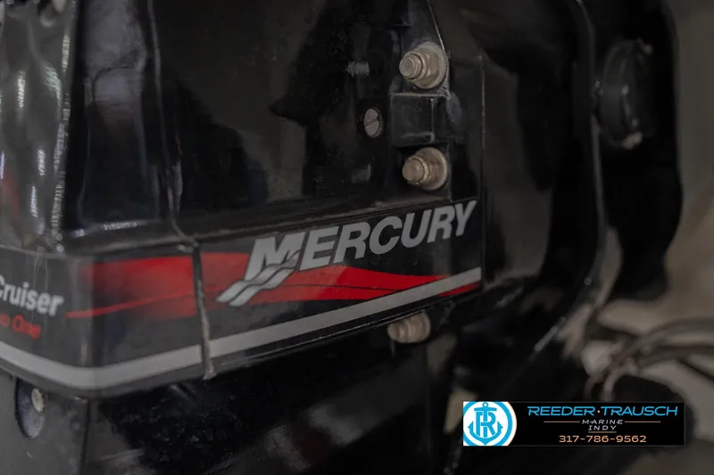 Slide: The Image of Mercury engine detail on Nordic Heat 28, 2001 model, with Reeder Trausch Marine logo. - 50