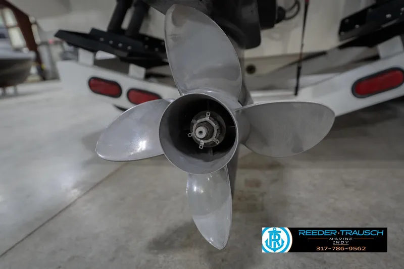 Slide: The Image of Close-up of a 2001 Nordic Heat 28 boat propeller in a showroom. - 51
