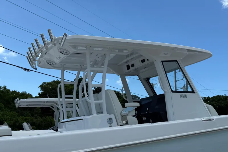 Slide: The Image of 2026 Everglades 335 Center Console boat with sleek design and modern features. - 19