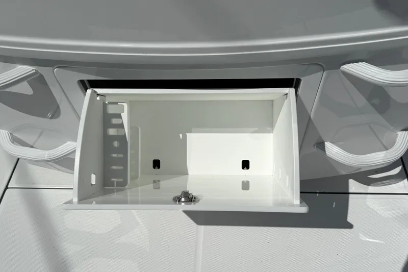 Slide: The Image of Open storage compartment on 2026 Everglades 335 Center Console boat. - 37
