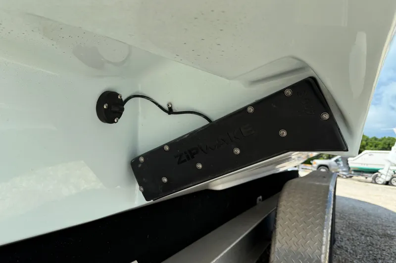 Slide: The Image of 2026 Everglades 335 Center Console boat with Zipwake trim system detail. - 50