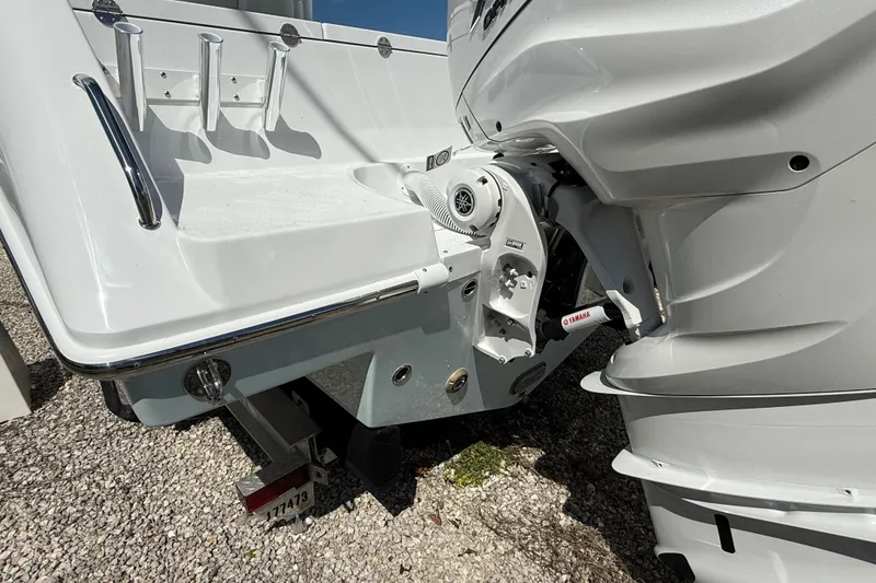 Slide: The Image of 2026 Everglades 335 Center Console boat with Yamaha outboard motor, rear view. - 51