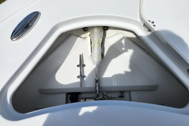 Slide: The Image of Anchor storage compartment of 2026 Sportsman Heritage 231 Center Console boat. - 11