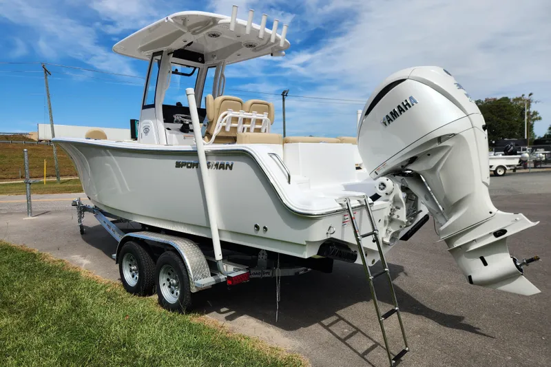 Slide: The Image of 2026 Sportsman Heritage 231 Center Console boat with Yamaha engine on trailer. - 4