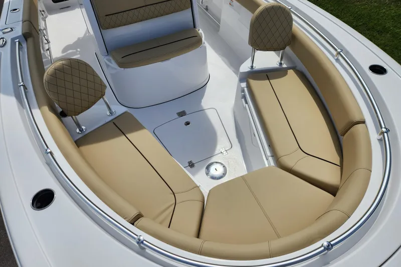 Slide: The Image of 2026 Sportsman Heritage 231 Center Console boat with tan seating and sleek design. - 9