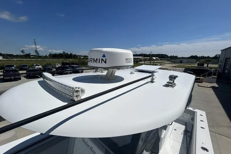 Slide: The Image of 2022 Onslow Bay 33 Tournament boat with Garmin radar on top. - 12