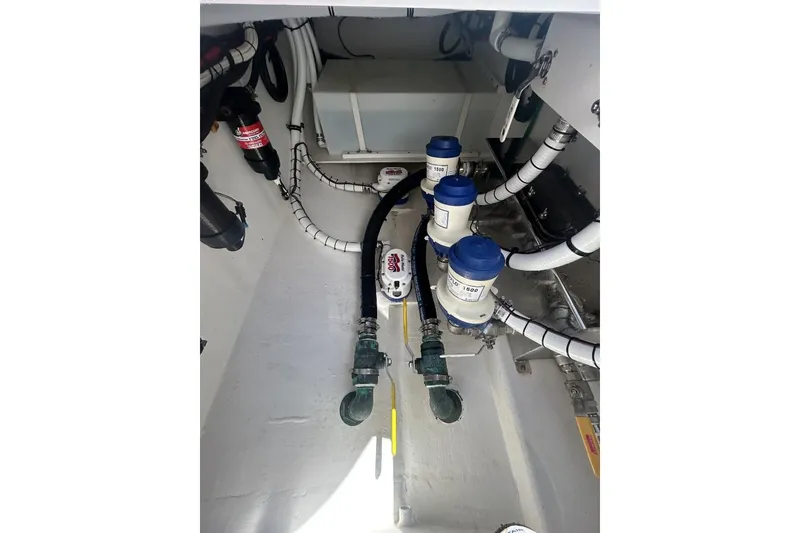 Slide: The Image of 2022 Onslow Bay 33 Tournament boat interior with plumbing and wiring systems. - 15