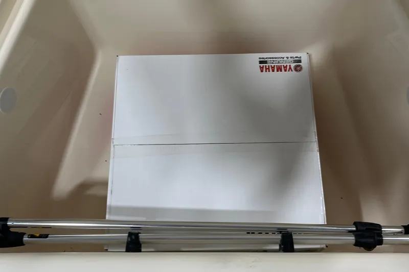 Slide: The Image of Yamaha box inside 2025 Scout 175 Sport Dorado boat compartment. - 11
