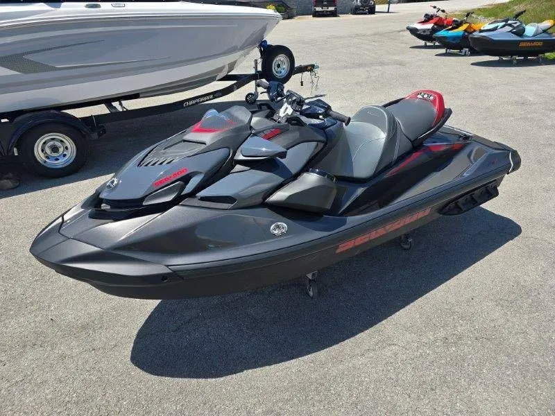 Slide: The Image of 2026 Sea-Doo GTR-X 300 jet ski displayed in parking lot. - 16