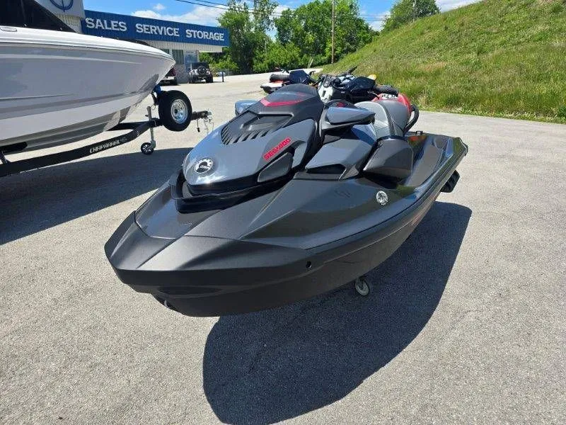 Slide: The Image of 2026 Sea-Doo GTR-X 300 jet ski parked in sunny lot. - 20