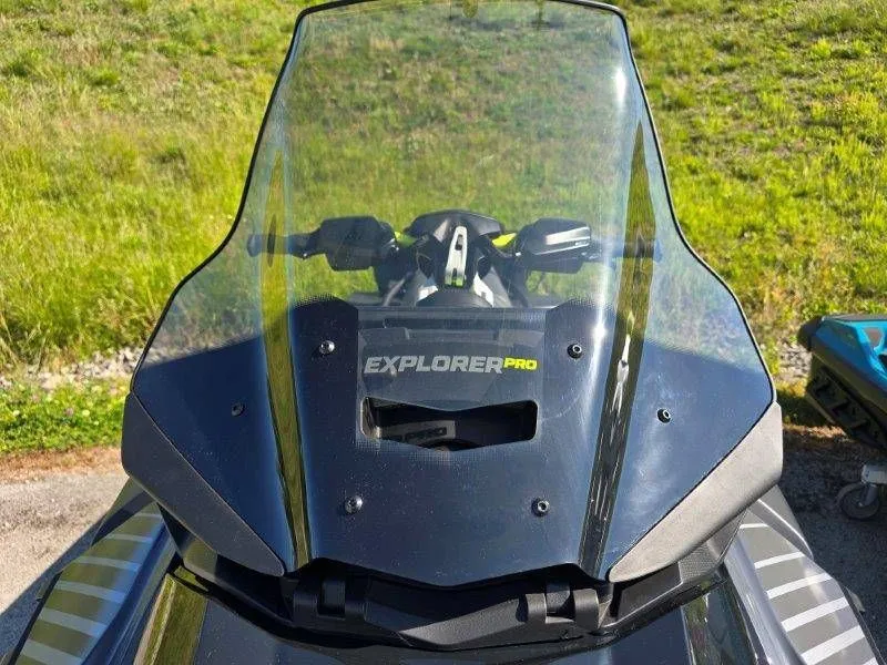 Slide: The Image of 2026 Sea-Doo Explorer Pro 170 with windshield outdoors. - 24