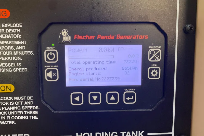 Slide: The Image of Fischer Panda generator display on 2024 Grady-White Freedom 375 boat, showing operational data. - 15