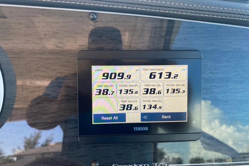 Slide: The Image of Display screen on 2024 Grady-White Freedom 375 showing trip data and fuel usage. - 18