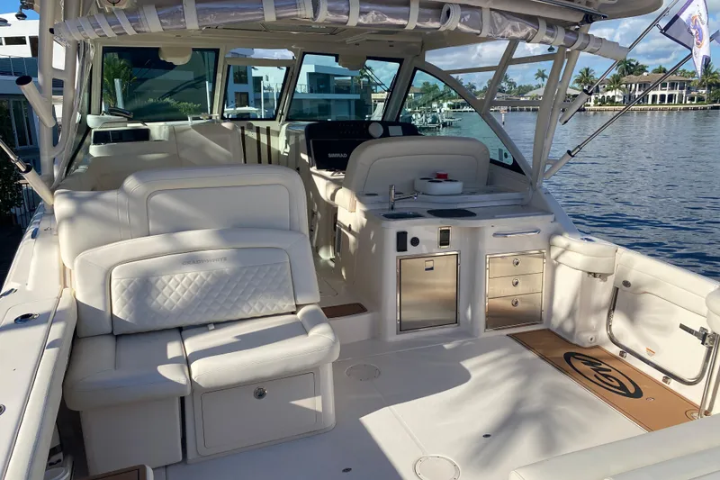 Slide: The Image of 2024 Grady-White Freedom 375 boat interior with luxurious seating and modern amenities. - 21