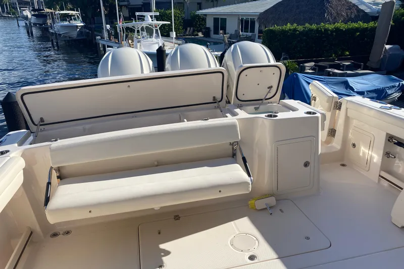 Slide: The Image of 2024 Grady-White Freedom 375 boat interior with seating and storage compartments. - 23