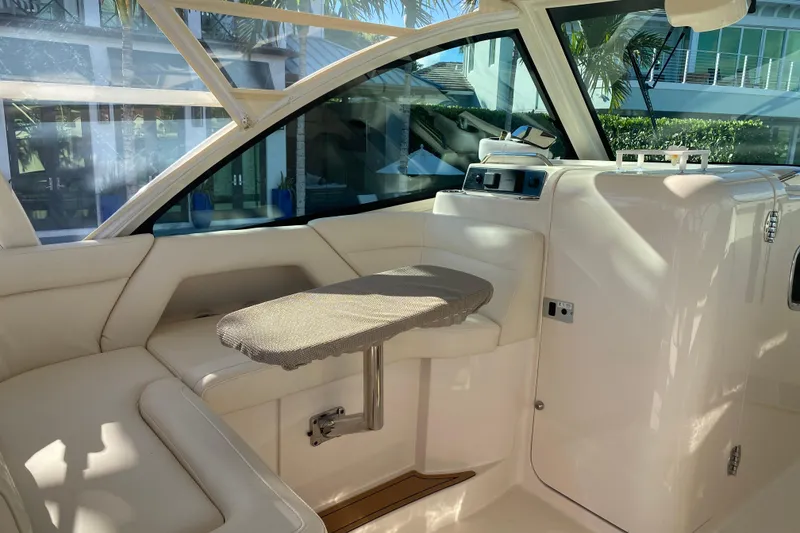 Slide: The Image of 2024 Grady-White Freedom 375 boat interior with seating and table. - 8