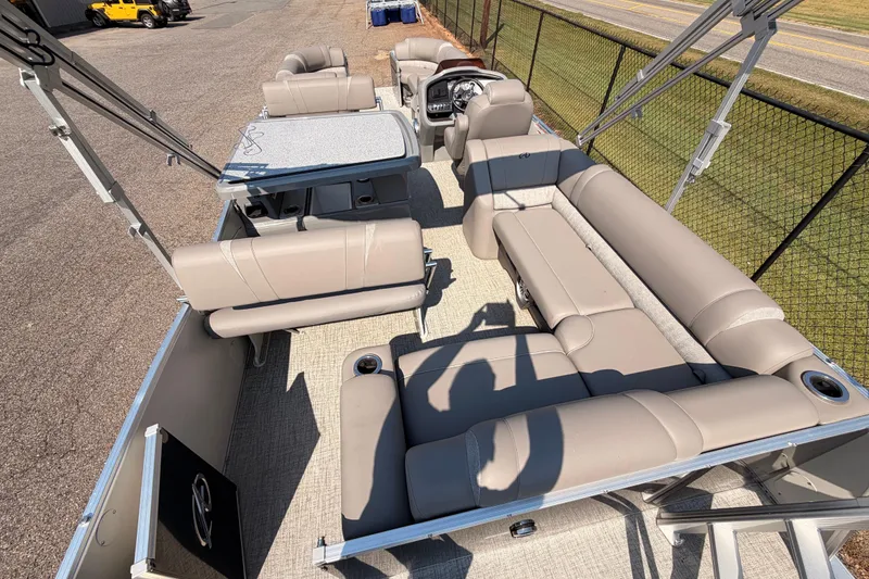 Slide: The Image of 2022 Avalon 2585 ENT Catalina Platinum pontoon boat with spacious seating and table. - 17