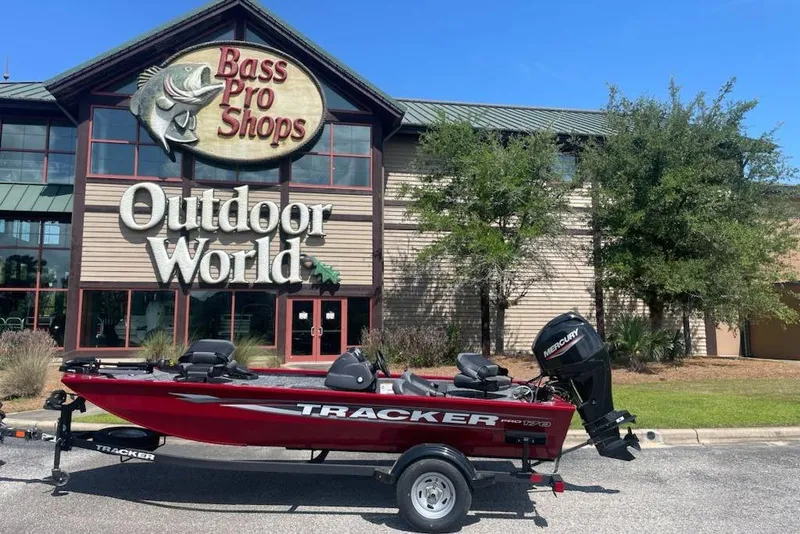 Slide: The Image of 2026 Tracker Pro 170 boat outside Bass Pro Shops Outdoor World. - 2