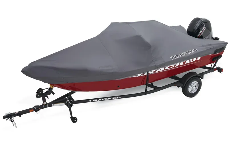 Slide: The Image of 2026 Tracker Pro Guide V-16 WT boat on trailer, parked outdoors. - 6