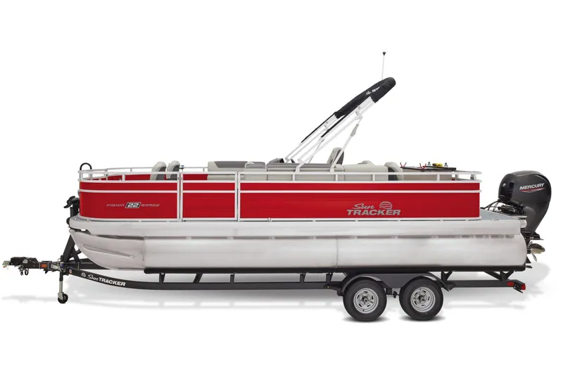 Slide: The Image of 2026 Sun Tracker Fishin' Barge 22 DLX interior with seating and storage compartments. - 8