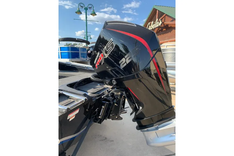 Slide: The Image of 2025 Nitro ZV20 boat with Mercury Pro XS 225 outboard motor, displayed outdoors. - 11