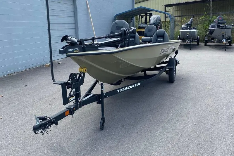 Slide: The Image of 2026 Tracker Pro Team 190 boat on trailer, parked outdoors. - 3
