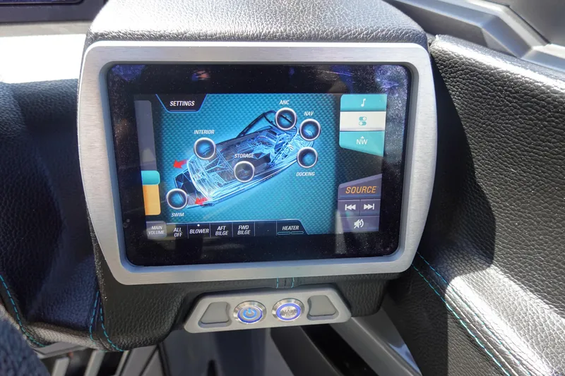 Slide: The Image of Touchscreen control panel in a 2019 Malibu Wakesetter 23 LSV boat dashboard. - 14