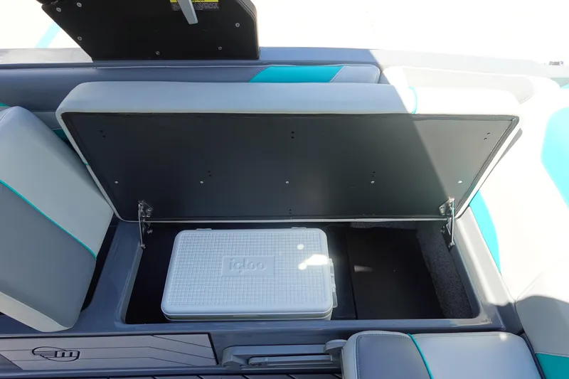 Slide: The Image of 2019 Malibu Wakesetter 23 LSV storage compartment with Igloo cooler inside. - 19