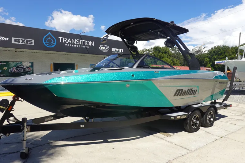 Slide: The Image of 2019 Malibu Wakesetter 23 LSV boat on trailer at Transition Watersports dealership. - 2