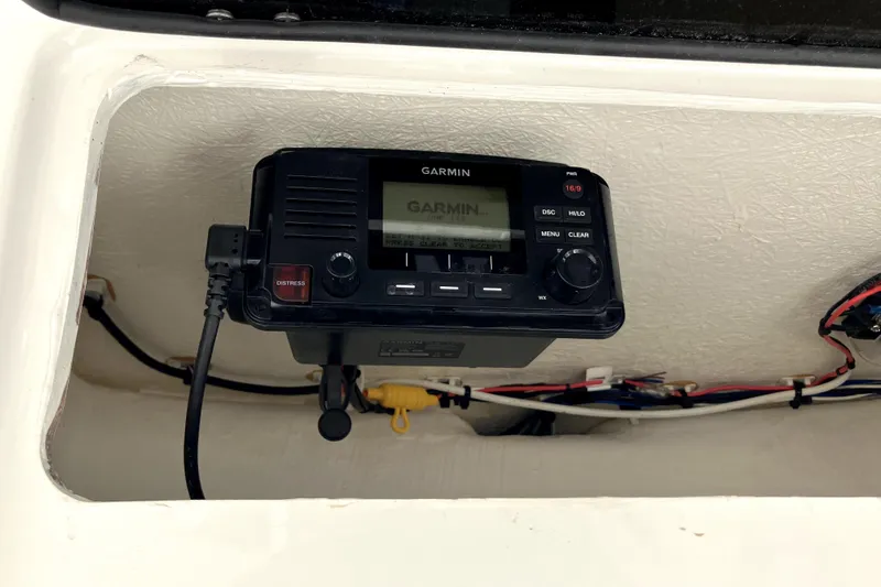 Slide: The Image of Garmin marine radio installed on 2024 Parker 2200 Center Console boat. - 12