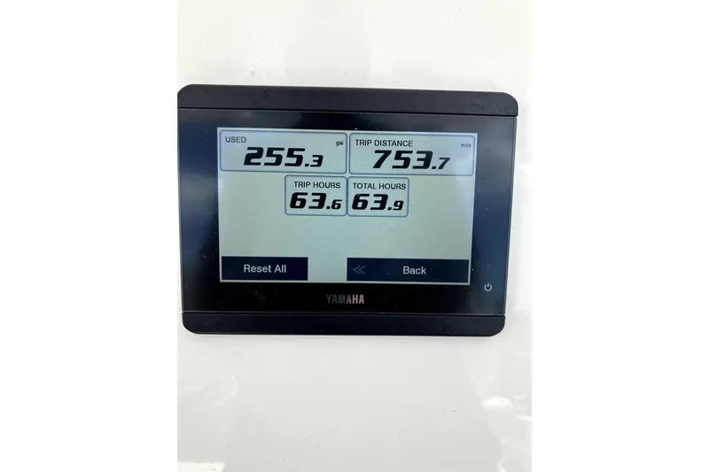 Slide: The Image of Yamaha display showing fuel usage, trip distance, and hours for Parker 2200 Center Console 2024. - 14