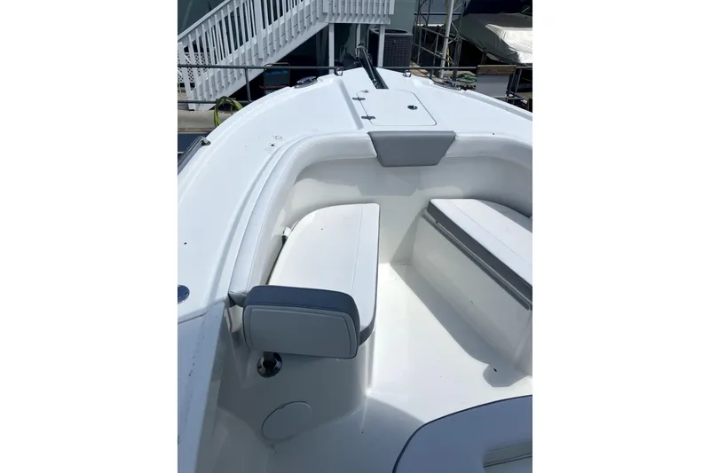 Slide: The Image of 2024 Parker 2200 Center Console boat interior with seating and storage. - 20