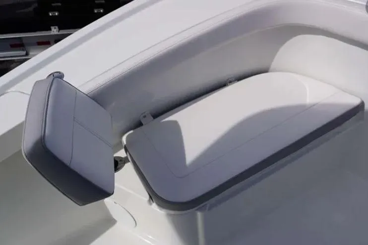 Slide: The Image of 2024 Parker 2200 Center Console boat seating area, featuring cushioned bench and backrest. - 8