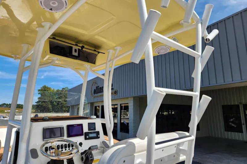 Slide: The Image of 2013 Sea Fox 226 Commander boat console with electronics and rod holders. - 12