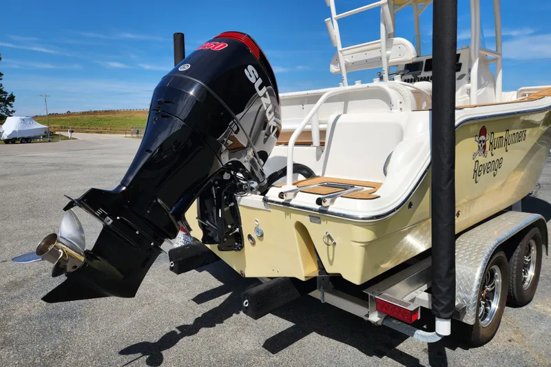 Slide: The Image of 2013 Sea Fox 226 Commander boat with Suzuki outboard motor on trailer. - 4